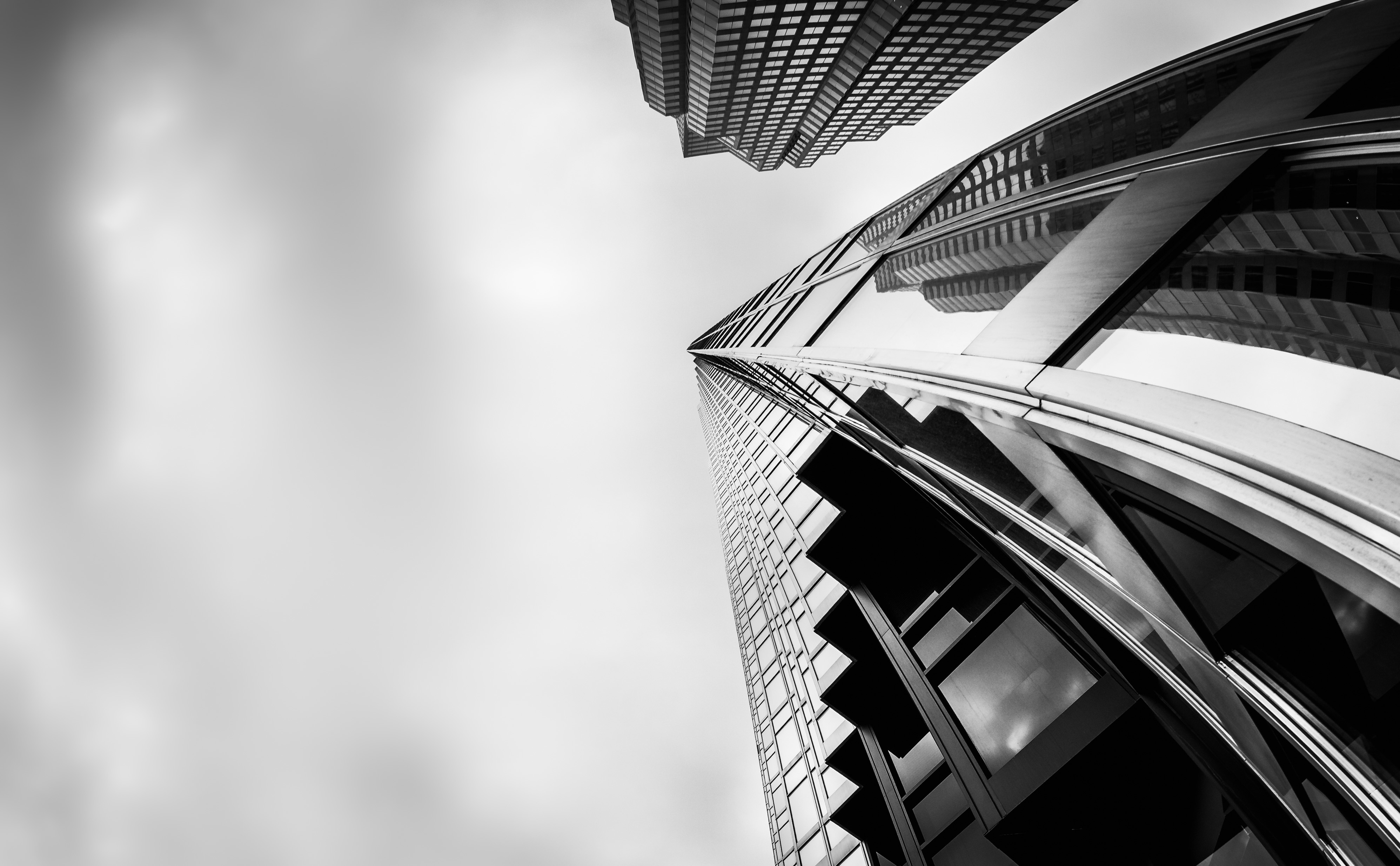 greyscale-low-angle-shot-high-rise-buildings-financial-district-toronto-canada-1
